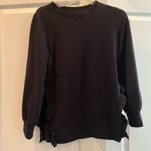 Black split side ruffle sweater